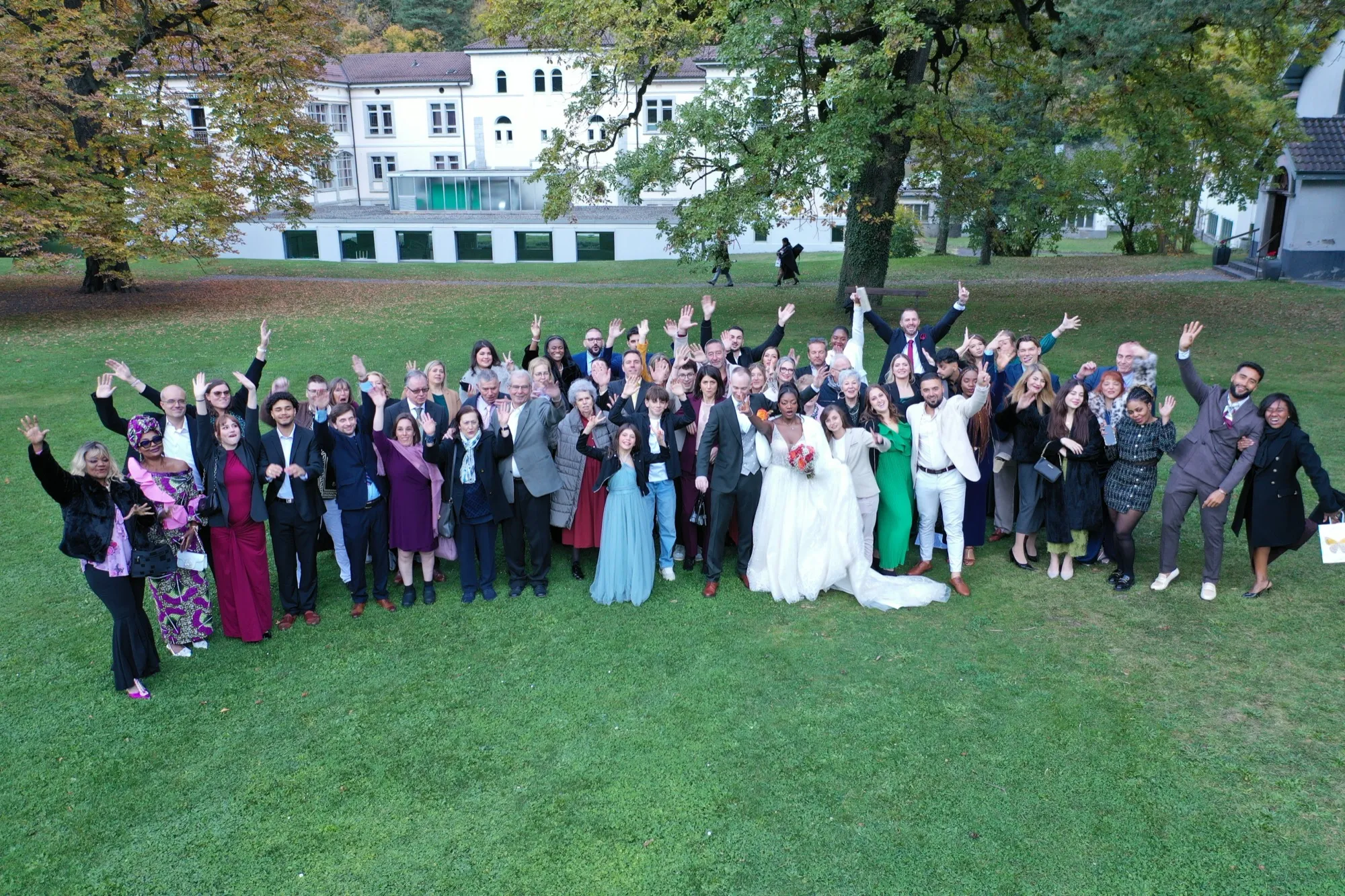 A group photo of all the guests, taken by drone