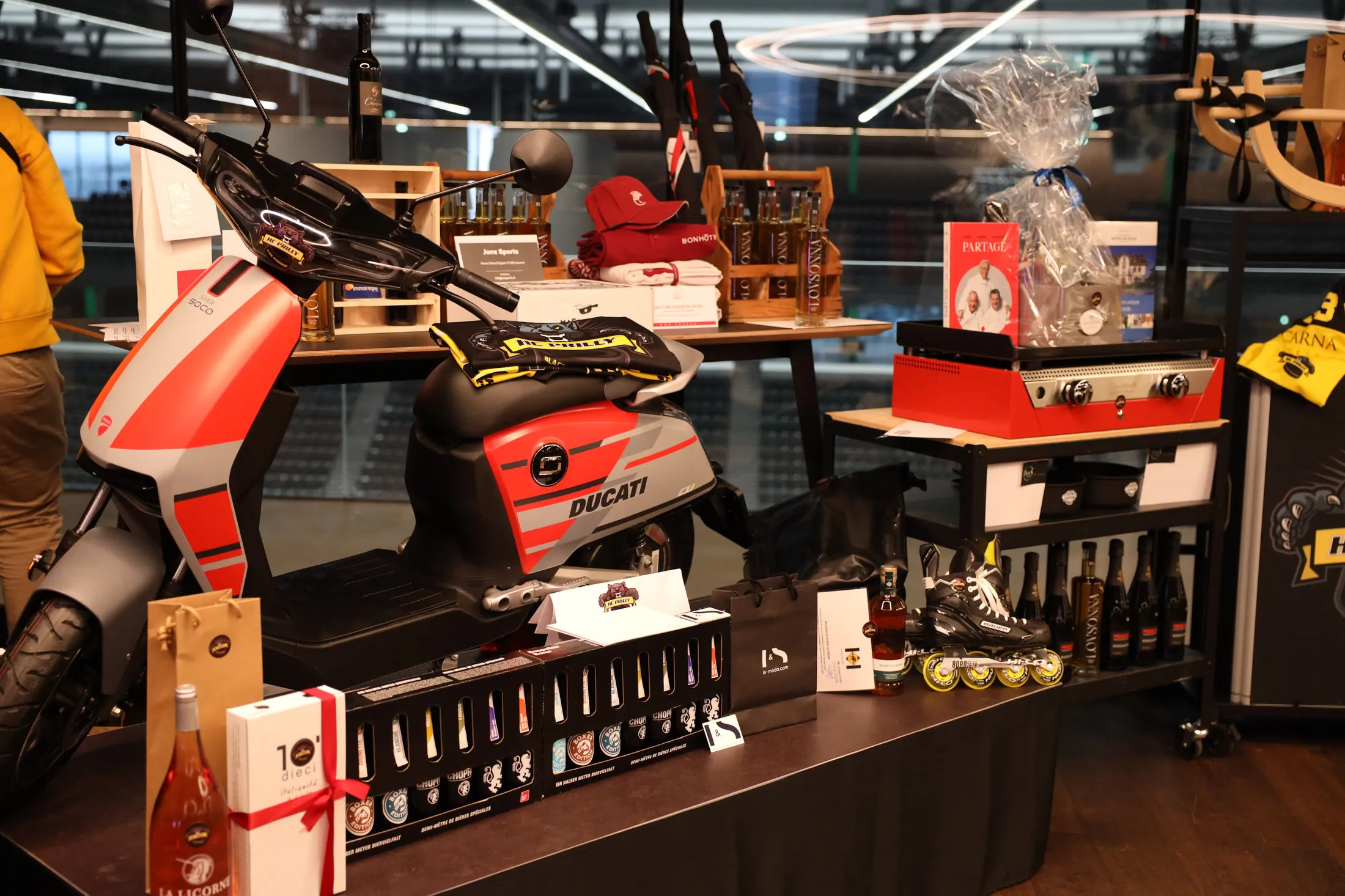 Table of prizes and partner gifts at an event
