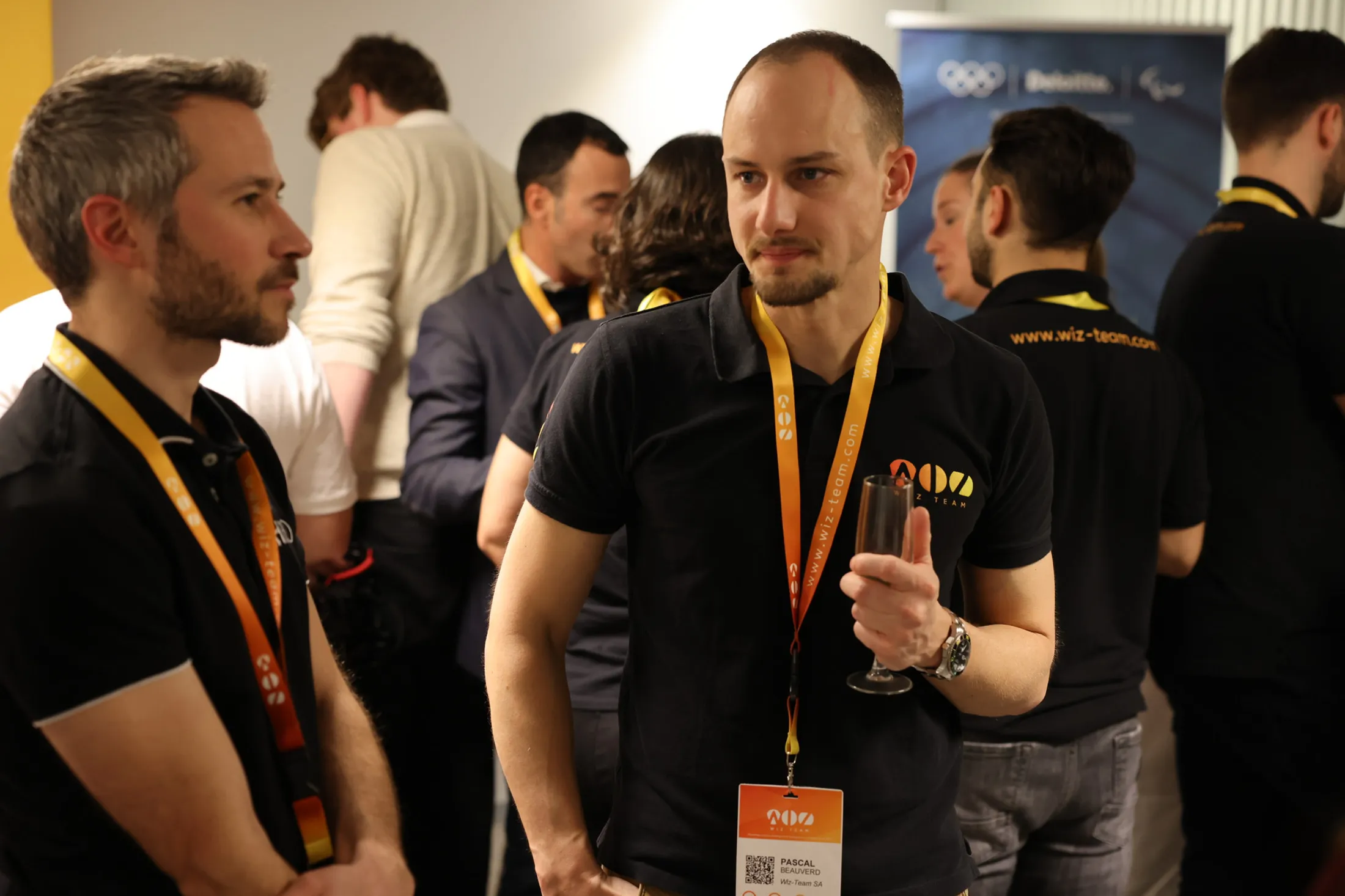 Attendees talking at an event