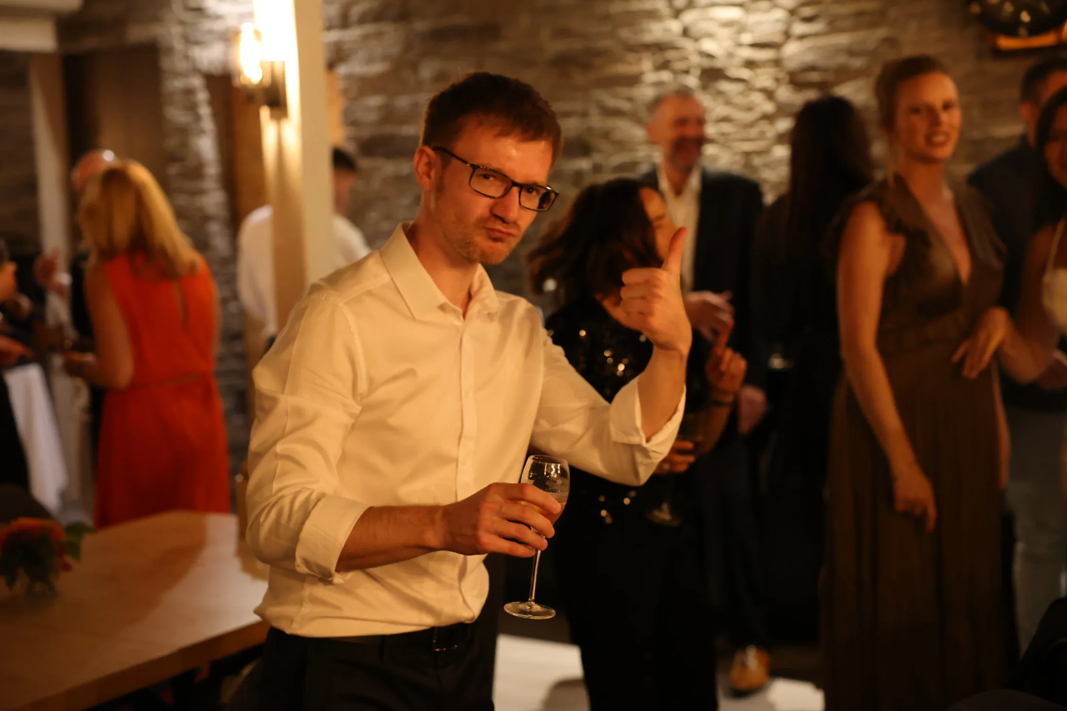 Guests raising a glass at a reception