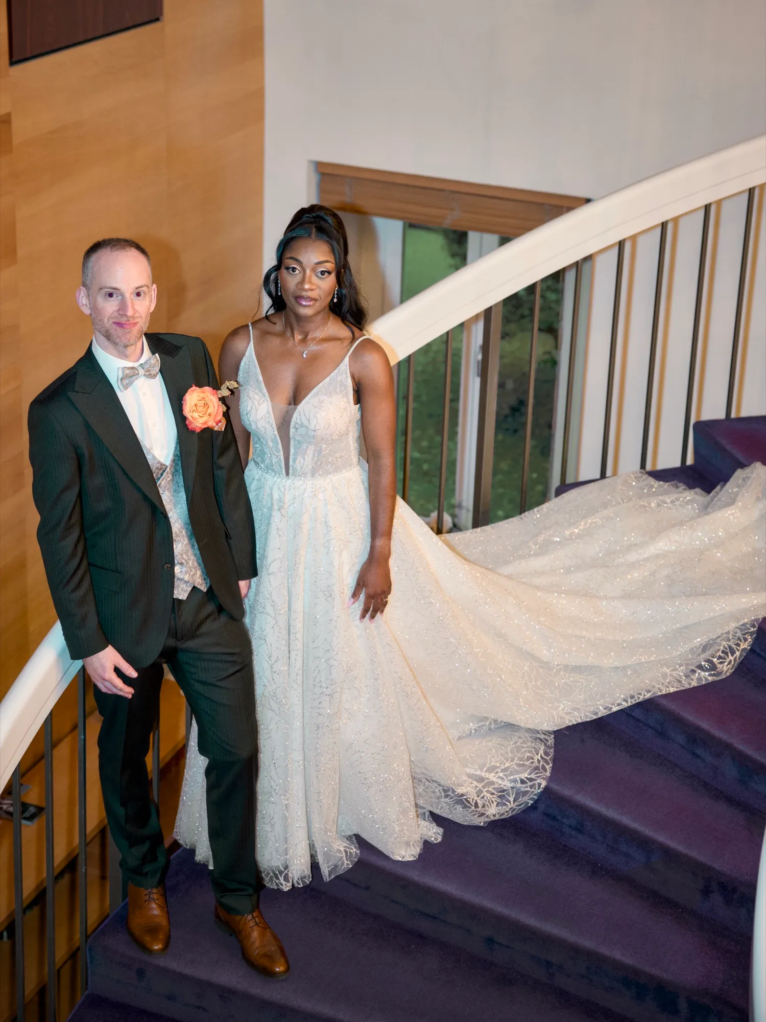 The couple on the hotel staircase