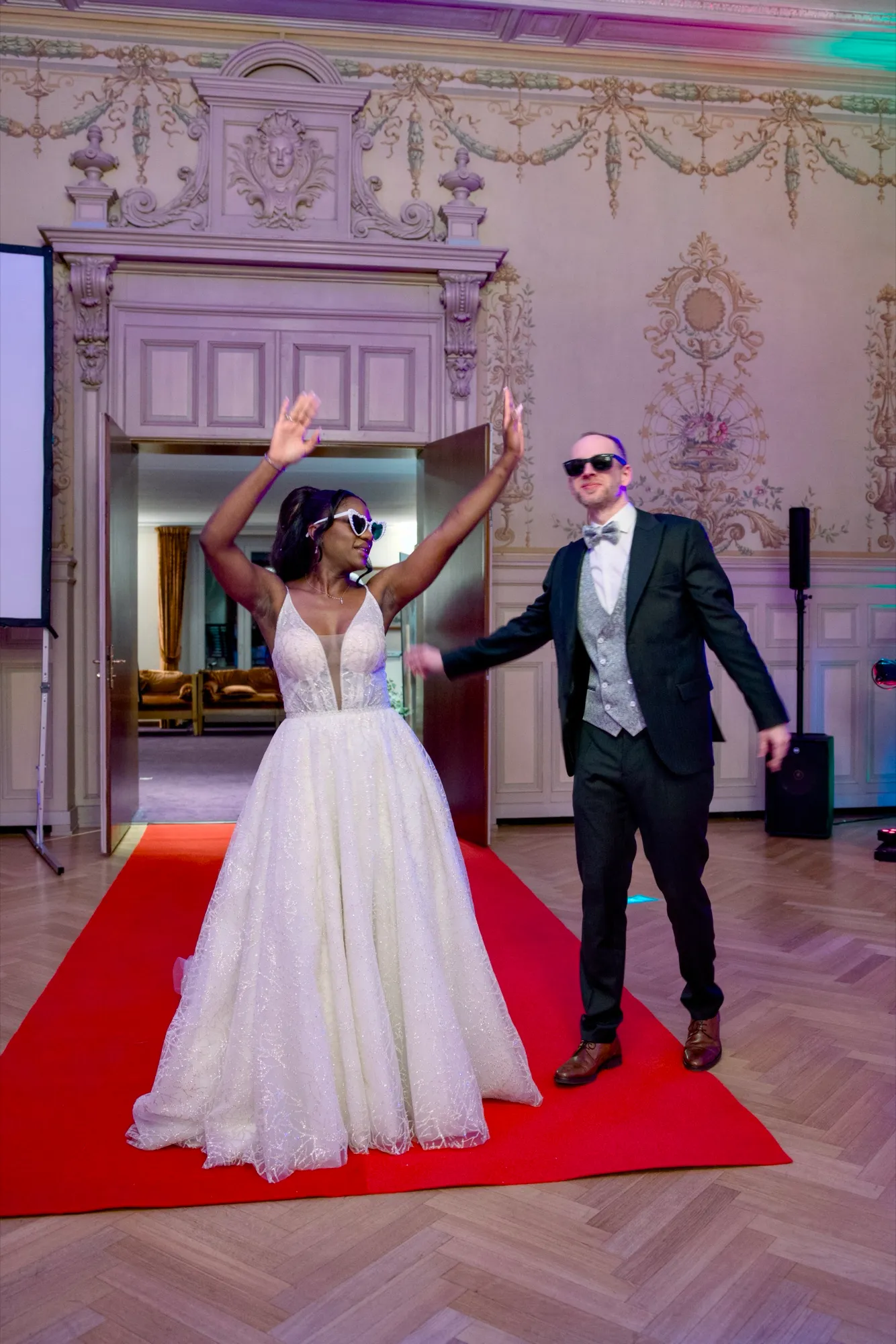 The couple entering the ballroom