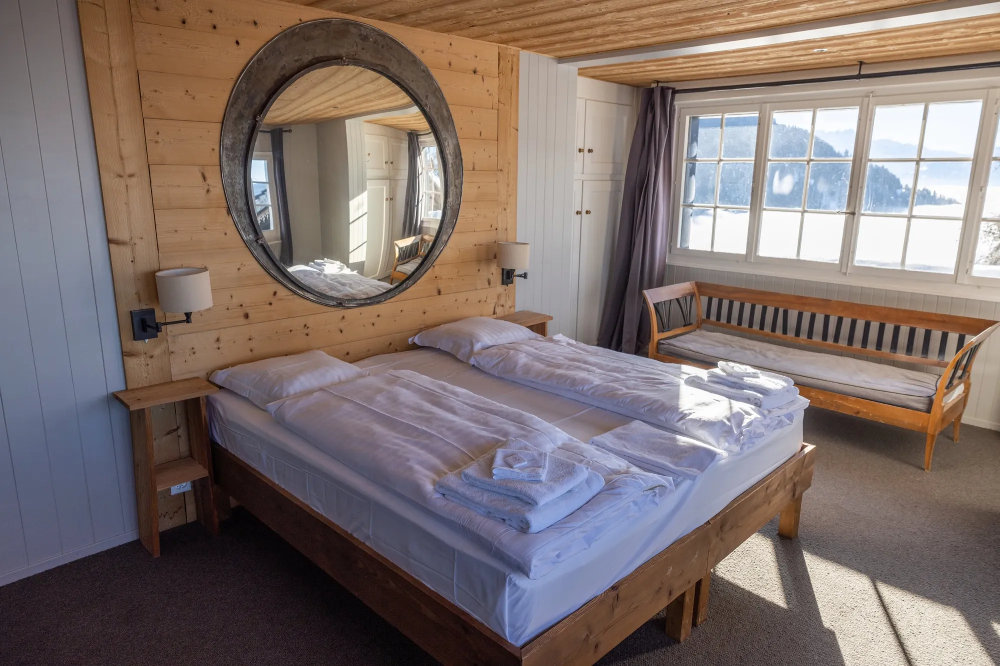 Hotel room in light wood, natural light
