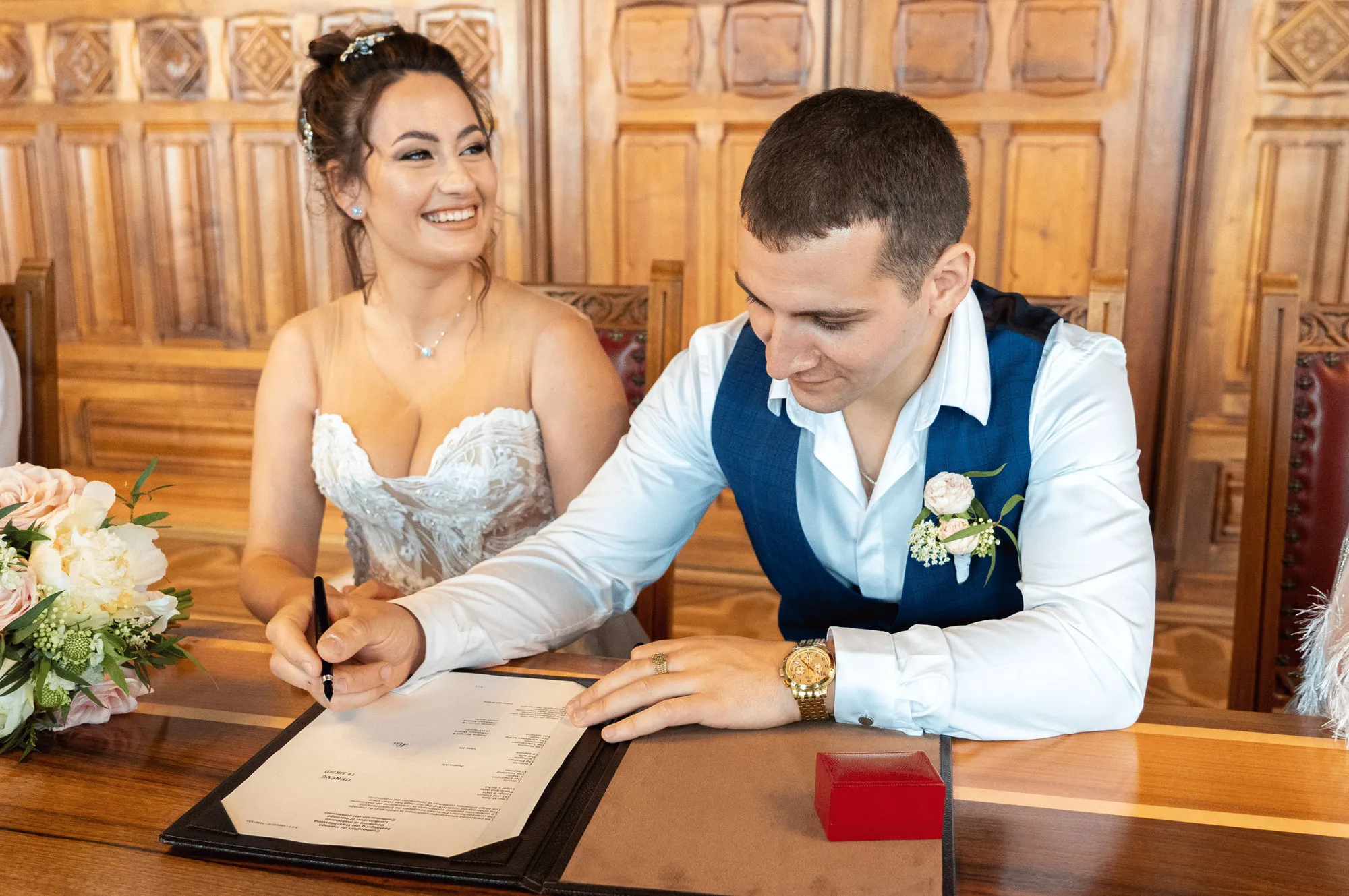 The couple signing the register at the town hall