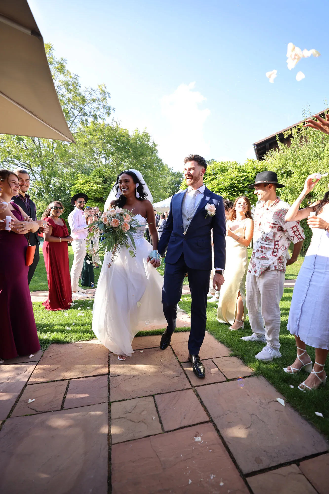 The couple’s entrance to their guests’ applause