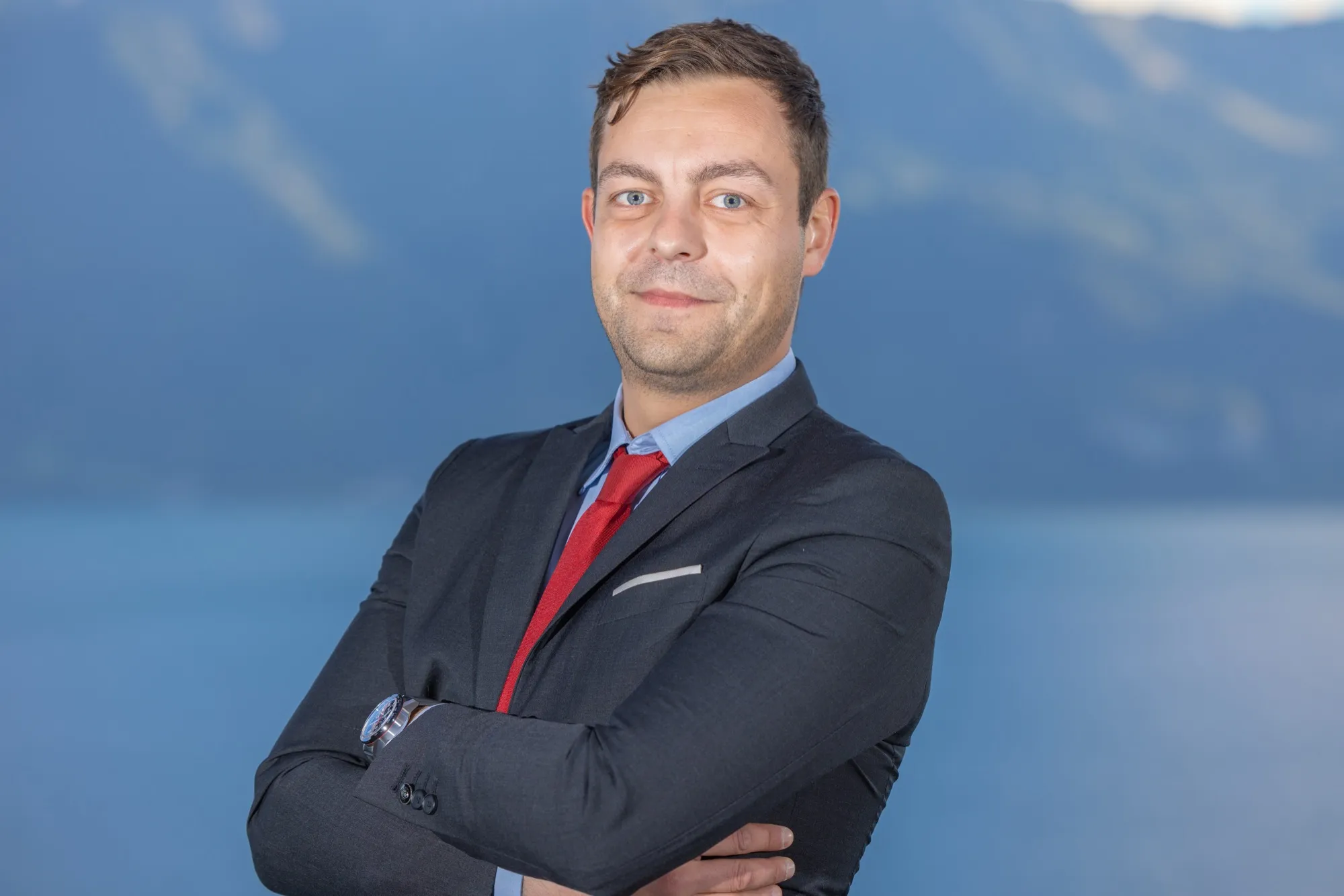 Portrait of an executive by Lake Geneva