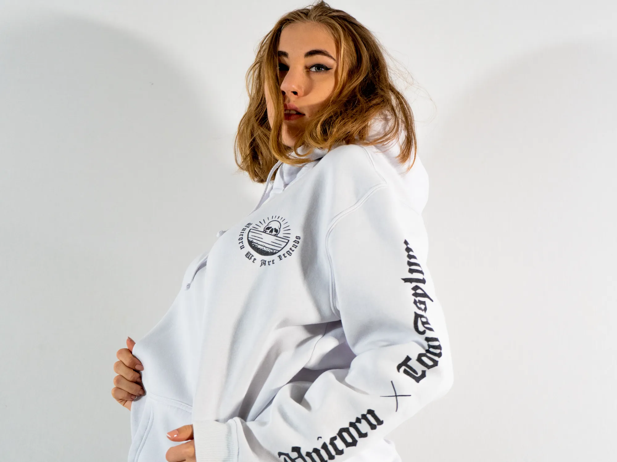 Studio fashion shoot, white sweatshirt