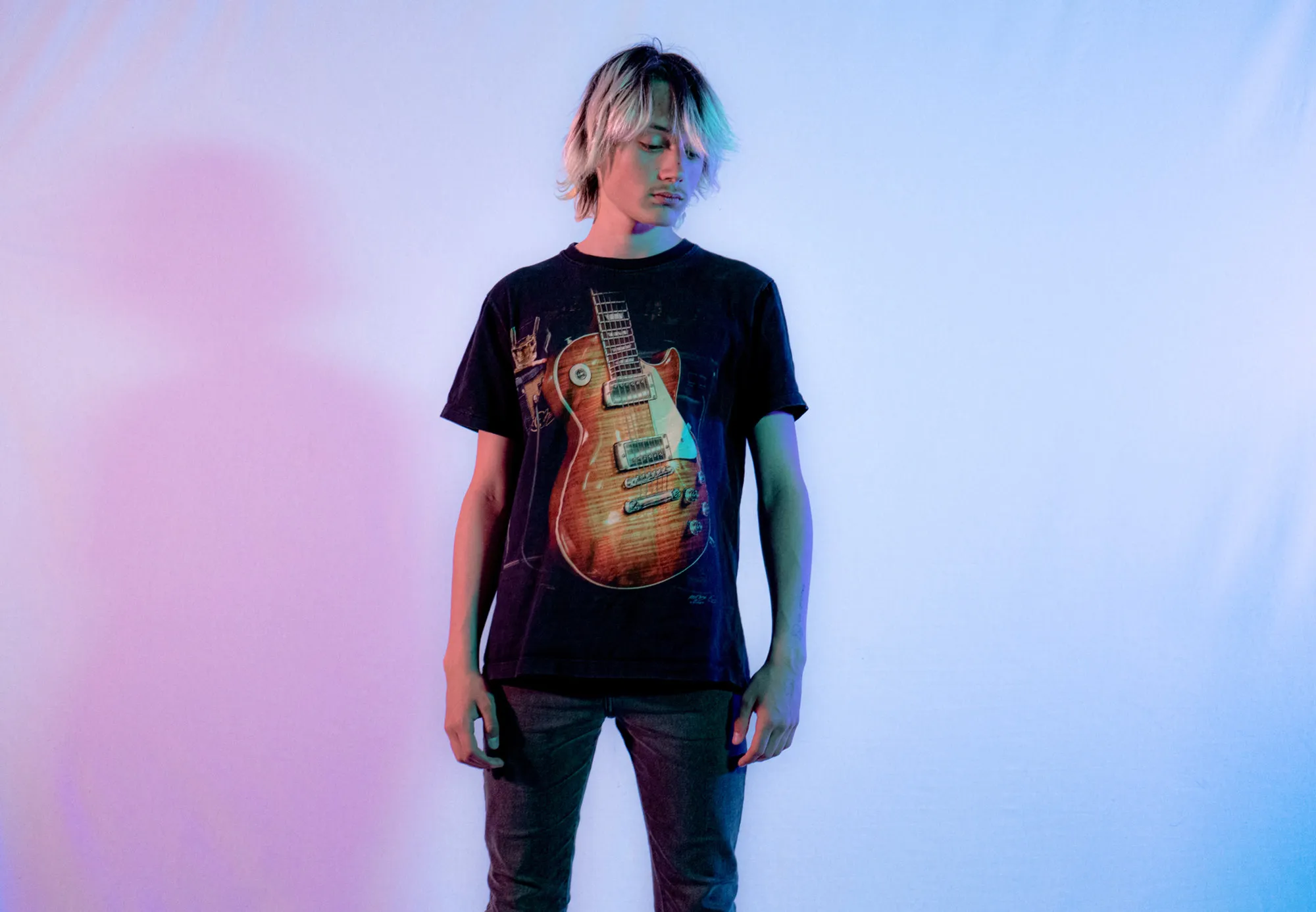 Studio portrait on a coloured background